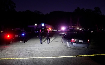Police at the scene of one of the shootings on Monday